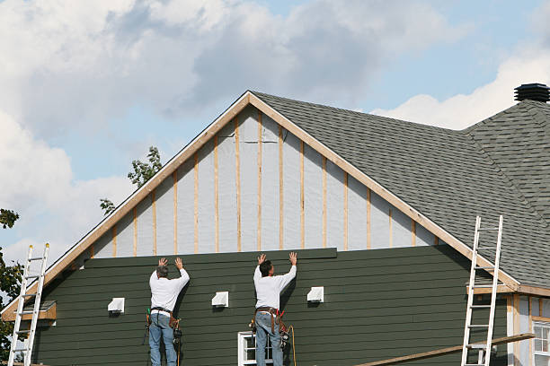 Professional Siding technician working in Westover, PA